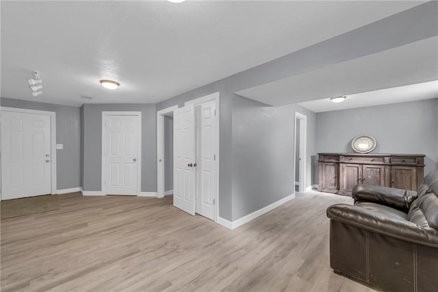 19133 E 15th St N, Independence, MO 64056 - living area featuring baseboards and light wood finished floors