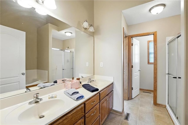 614 SW Tisha Ln, Grain Valley, MO 64029 - full bath with a stall shower, double vanity, a garden tub, and tile patterned flooring