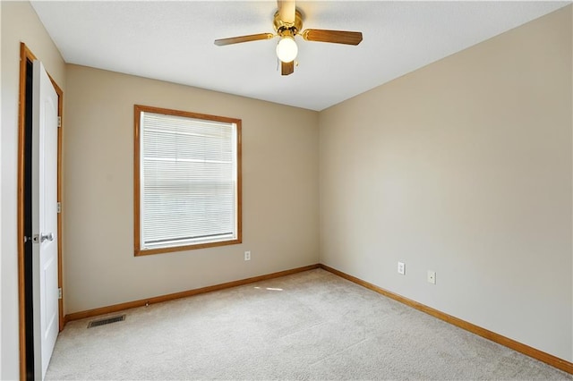 614 SW Tisha Ln, Grain Valley, MO 64029 - unfurnished room with light colored carpet and a ceiling fan