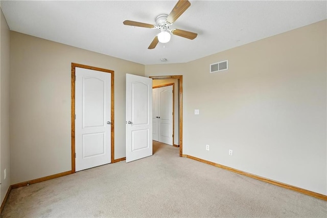 614 SW Tisha Ln, Grain Valley, MO 64029 - unfurnished bedroom with carpet floors and a ceiling fan