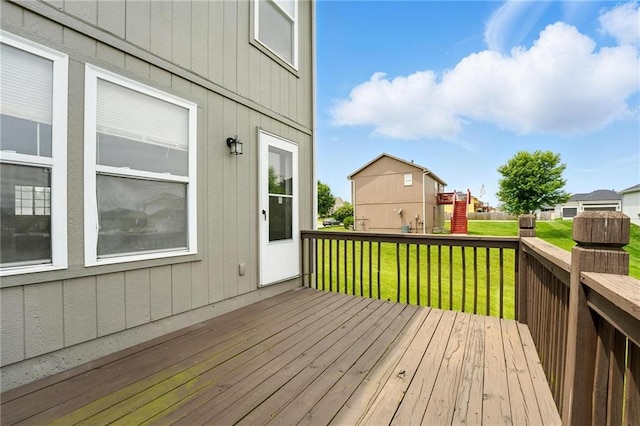 614 SW Tisha Ln, Grain Valley, MO 64029 - wooden deck with a lawn