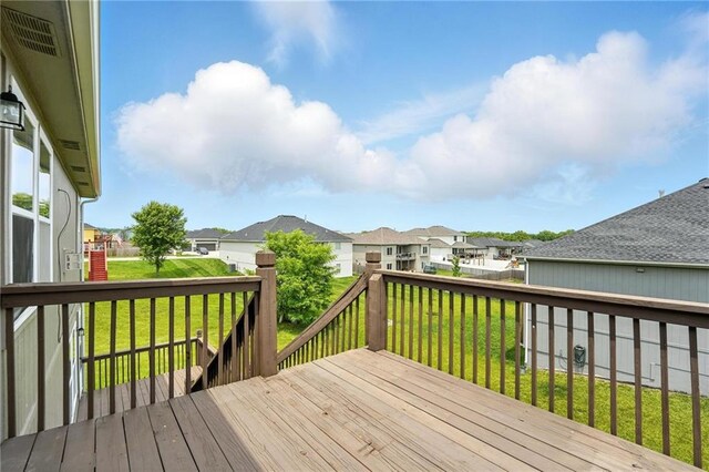 614 SW Tisha Ln, Grain Valley, MO 64029 - wooden terrace featuring a residential view and a yard