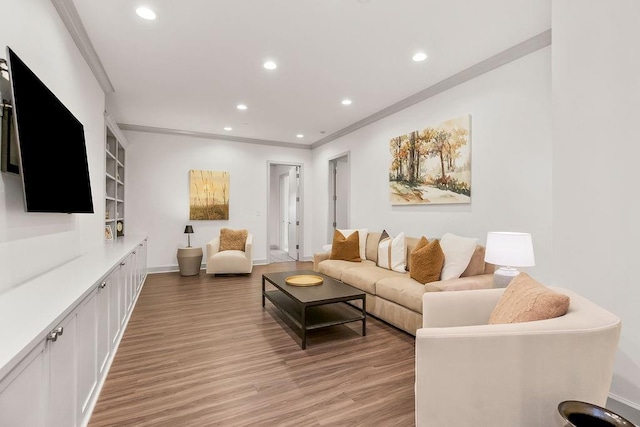 400 W 49th Ter Unit 2106, Kansas City, MO 64112 - living area featuring light wood-style floors, crown molding, recessed lighting, and baseboards