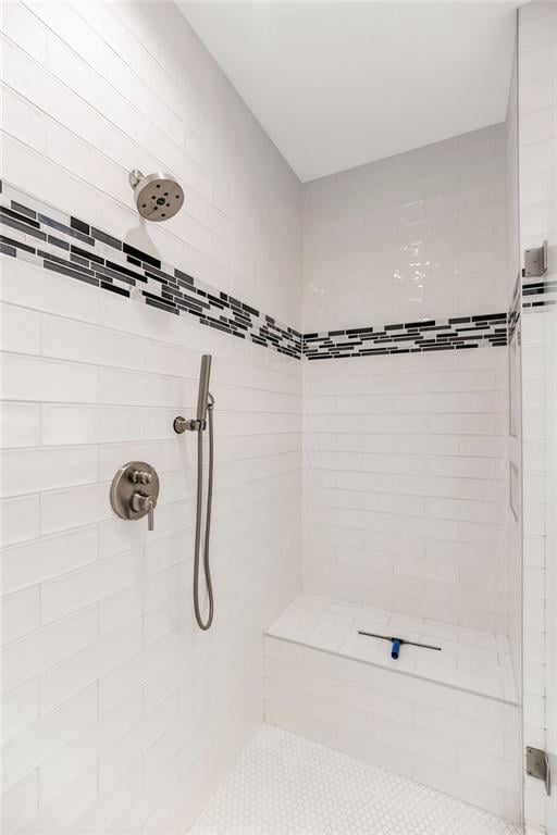 400 W 49th Ter Unit 2106, Kansas City, MO 64112 - bathroom with tiled shower