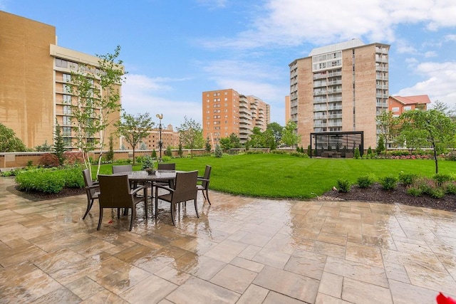 400 W 49th Ter Unit 2106, Kansas City, MO 64112 - view of patio with outdoor dining area