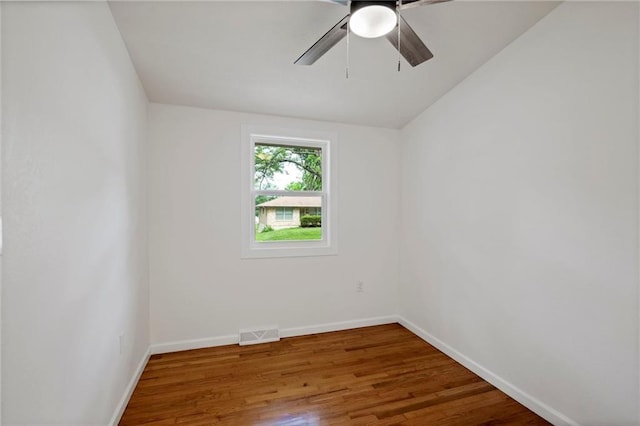 3523 Drumm Ave, Independence, MO 64055 - empty room with wood finished floors, baseboards, and a ceiling fan