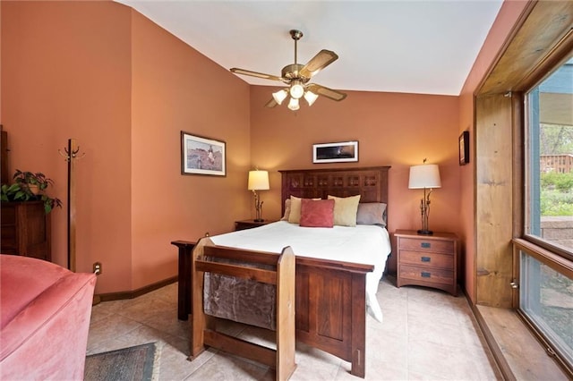 19913 Pepper Tree Rd, Edgerton, KS 66021 - bedroom with light tile patterned floors, lofted ceiling, and a ceiling fan