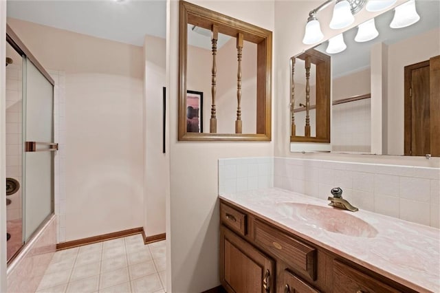 19913 Pepper Tree Rd, Edgerton, KS 66021 - full bath with vanity, tiled shower / bath combo, and backsplash