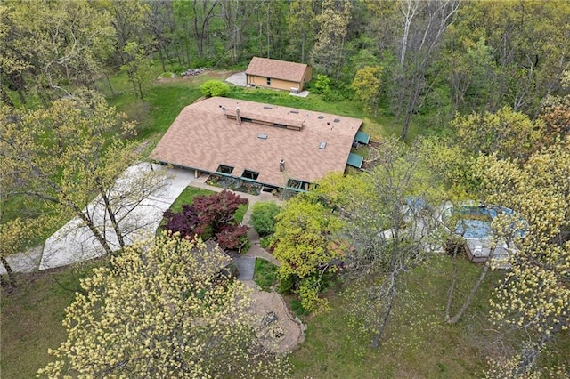 19913 Pepper Tree Rd, Edgerton, KS 66021 - aerial view of property and surrounding area with a heavily wooded area