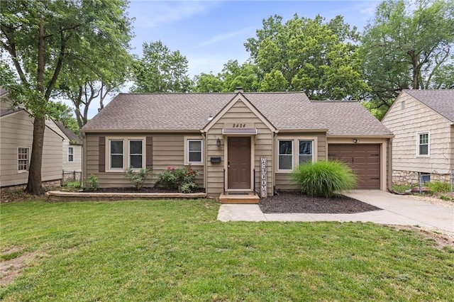8424 Ward Parkway Plz, Kansas City, MO 64114 - view of front of property featuring an attached garage, concrete driveway, a front yard, and a shingled roof