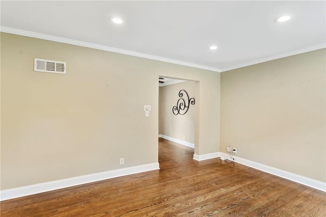8424 Ward Parkway Plz, Kansas City, MO 64114 - spare room featuring ornamental molding, dark wood-type flooring, and recessed lighting