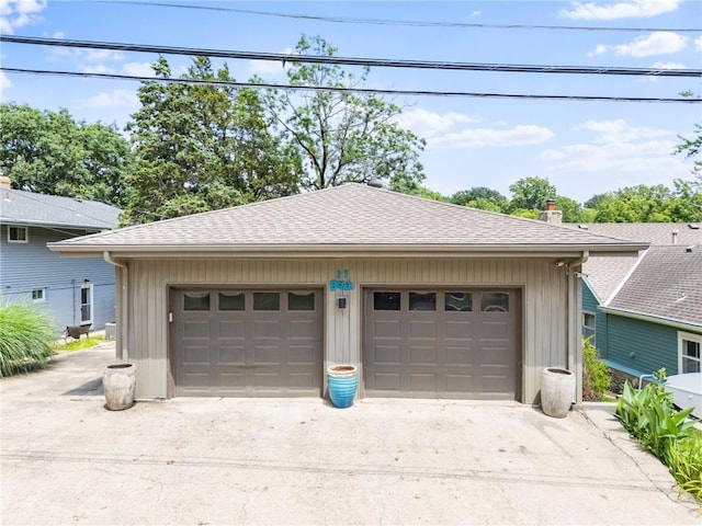 37 Beach Dr, Blue Springs, MO 64015 - garage with driveway
