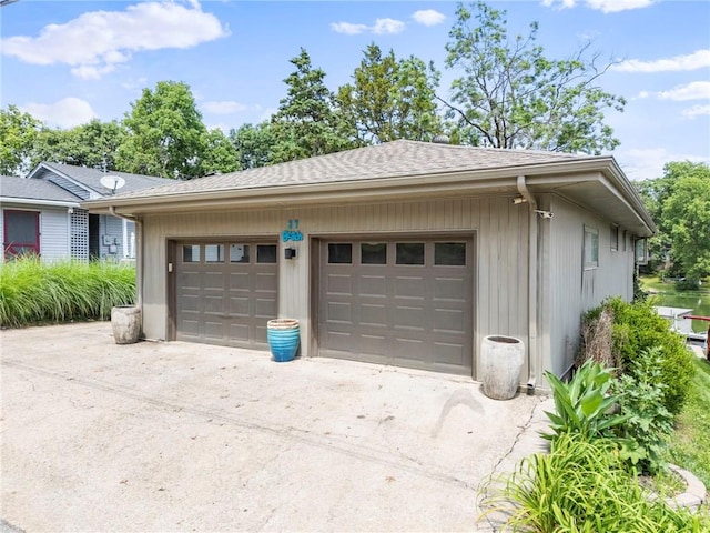 37 Beach Dr, Blue Springs, MO 64015 - garage with driveway