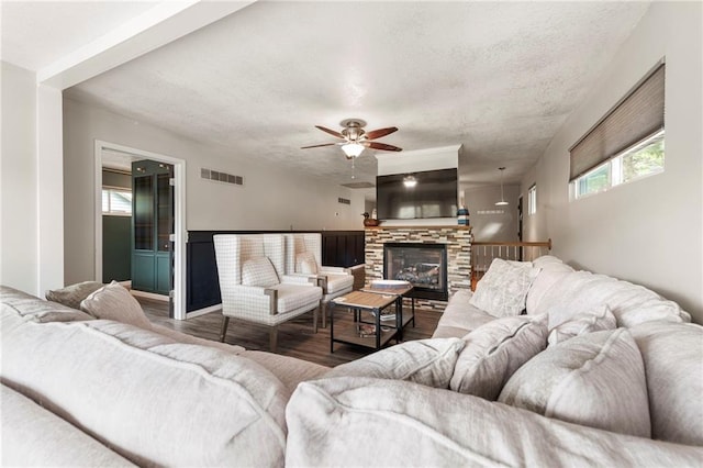 37 Beach Dr, Blue Springs, MO 64015 - living area featuring wood finished floors, ceiling fan, and a textured ceiling