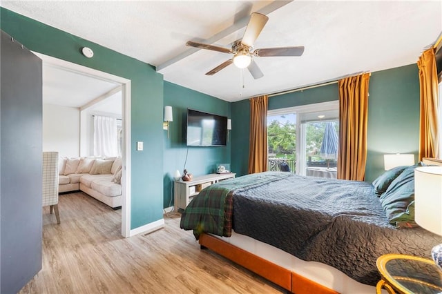 37 Beach Dr, Blue Springs, MO 64015 - bedroom featuring wood finished floors, baseboards, and a ceiling fan