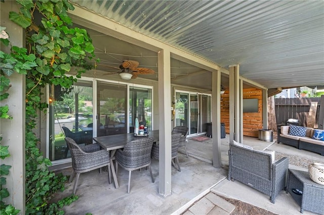 37 Beach Dr, Blue Springs, MO 64015 - view of patio with outdoor lounge area, a ceiling fan, and outdoor dining space