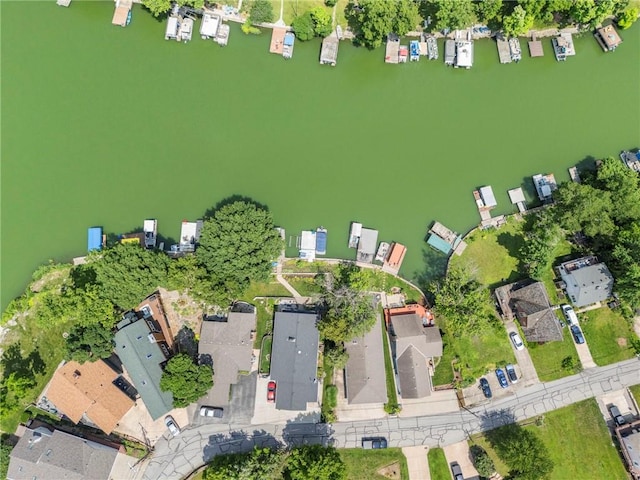 37 Beach Dr, Blue Springs, MO 64015 - aerial view of property and surrounding area featuring a nearby body of water and nearby suburban area