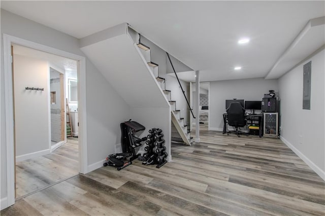 604 Lake Rd, Garden City, MO 64747 - office area with wood finished floors, baseboards, recessed lighting, and electric panel