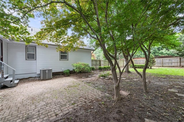 16000 E 28th St S, Independence, MO 64055 - view of yard with central air condition unit and a patio