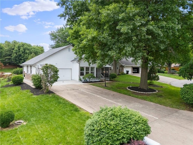 16000 E 28th St S, Independence, MO 64055 - view of front of property with driveway, a front lawn, and an attached garage