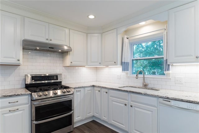 10246 Russell St, Overland Park, KS 66212 - kitchen featuring range with two ovens, white dishwasher, under cabinet range hood, white cabinetry, and recessed lighting