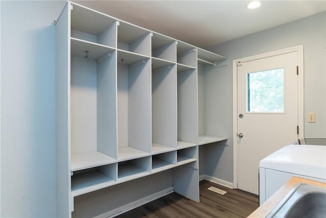 10246 Russell St, Overland Park, KS 66212 - mudroom featuring dark wood-type flooring, recessed lighting, and washing machine and clothes dryer