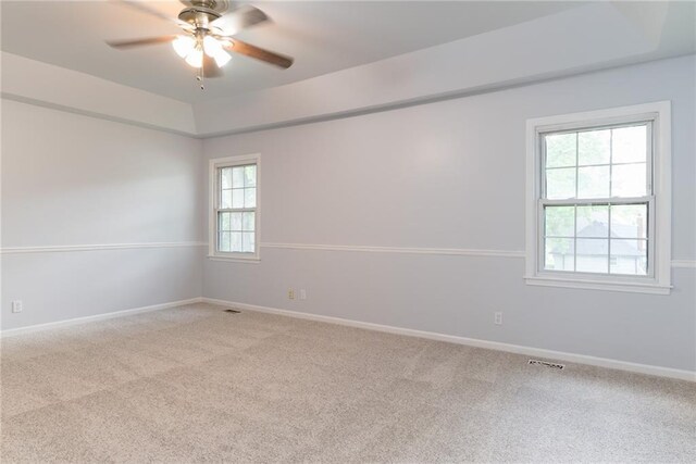 10246 Russell St, Overland Park, KS 66212 - carpeted spare room with ceiling fan and baseboards