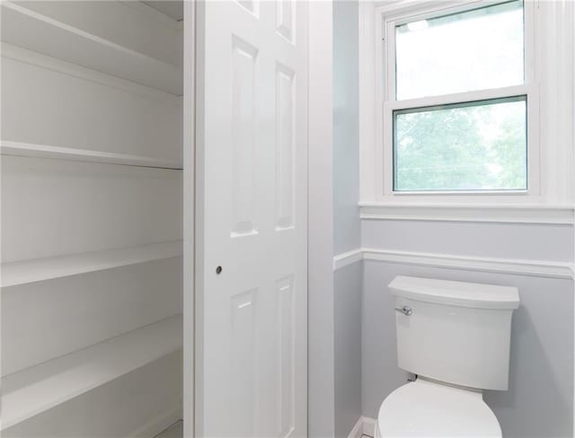 10246 Russell St, Overland Park, KS 66212 - bathroom with toilet and a closet
