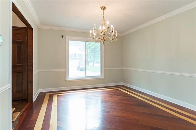 10246 Russell St, Overland Park, KS 66212 - unfurnished room with wood finished floors, a chandelier, and ornamental molding