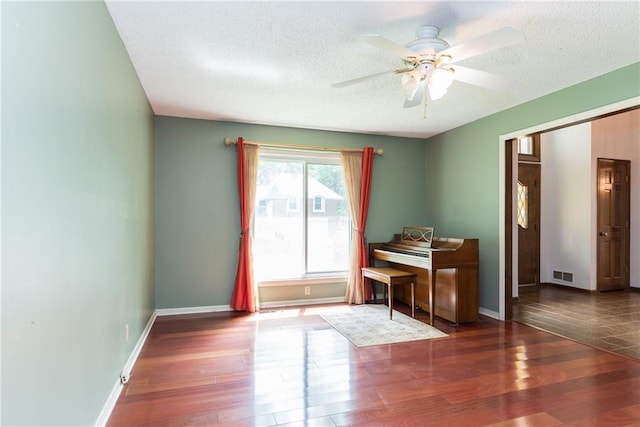10246 Russell St, Overland Park, KS 66212 - office area featuring a ceiling fan, wood finished floors, and a textured ceiling