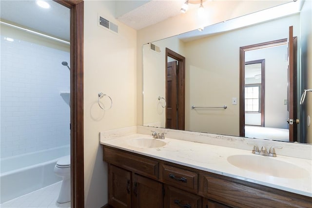 10246 Russell St, Overland Park, KS 66212 - bathroom with double vanity, shower / washtub combination, and tile patterned floors