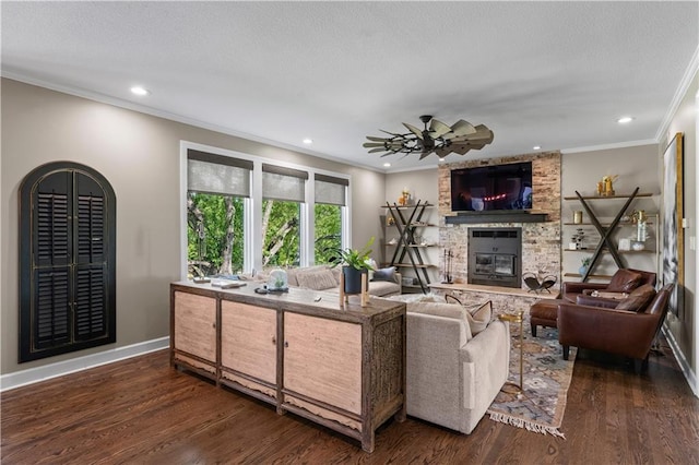 14906 Knorpp Rd, Pleasant Hill, MO 64080 - living room with ornamental molding, a fireplace, dark wood-style floors, recessed lighting, and a ceiling fan