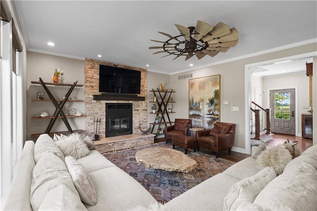 14906 Knorpp Rd, Pleasant Hill, MO 64080 - living area with a fireplace, recessed lighting, wood finished floors, ornamental molding, and a ceiling fan