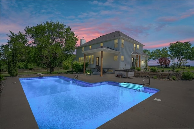 14906 Knorpp Rd, Pleasant Hill, MO 64080 - swimming pool featuring a patio, a hot tub, and a diving board