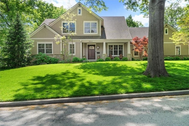 5812 Reinhardt Dr, Fairway, KS 66205 - craftsman-style home with a front lawn and stone siding
