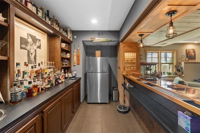 5812 Reinhardt Dr, Fairway, KS 66205 - kitchen featuring freestanding refrigerator, open shelves, hanging light fixtures, dark countertops, and recessed lighting
