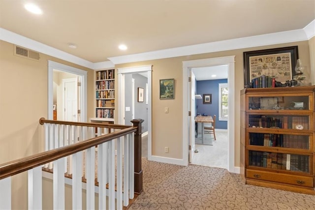 5812 Reinhardt Dr, Fairway, KS 66205 - hallway with an upstairs landing, light colored carpet, recessed lighting, baseboards, and built in features