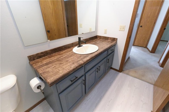 500 Valley View Dr, Frontenac, KS 66763 - bathroom featuring vanity and wood finished floors