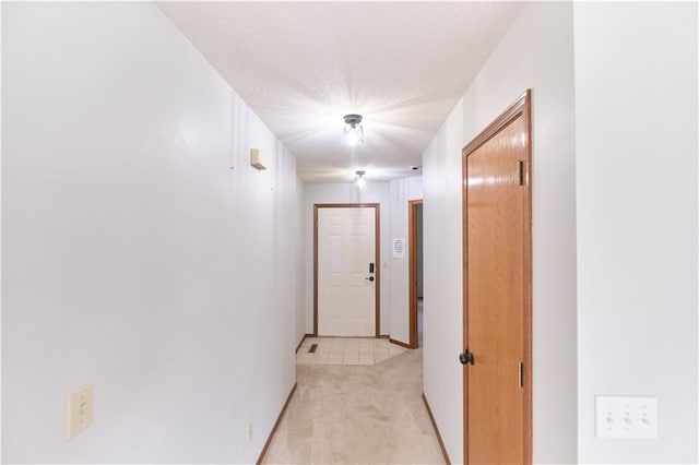 500 Valley View Dr, Frontenac, KS 66763 - hall with light colored carpet and a textured ceiling