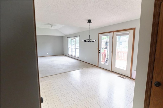 500 Valley View Dr, Frontenac, KS 66763 - spare room with light colored carpet, lofted ceiling, and a textured ceiling