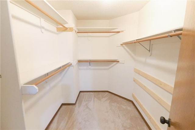 500 Valley View Dr, Frontenac, KS 66763 - walk in closet featuring light carpet