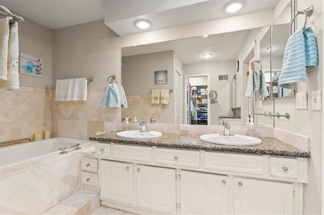 8410 W 117th St, Overland Park, KS 66210 - full bath with double vanity and a bath