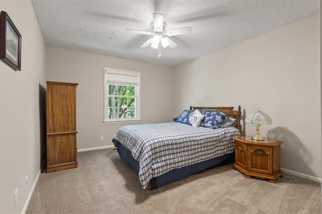 8410 W 117th St, Overland Park, KS 66210 - carpeted bedroom with a textured ceiling and ceiling fan