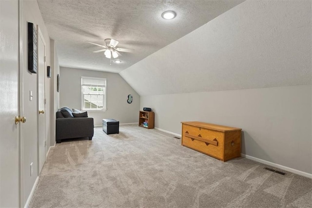 8410 W 117th St, Overland Park, KS 66210 - bonus room with carpet, a textured ceiling, a ceiling fan, and vaulted ceiling