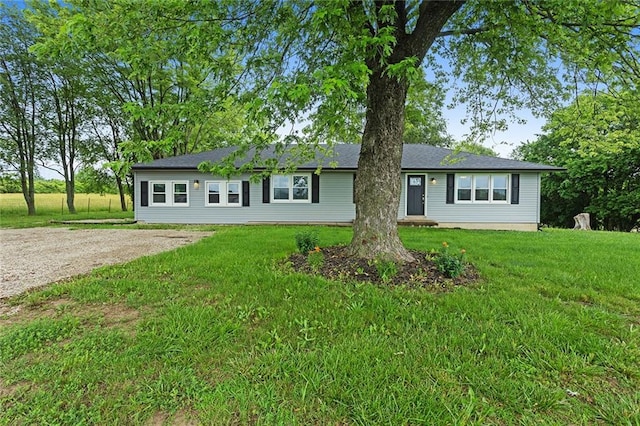 10203 Outer Rd, Odessa, MO 64076 - ranch-style house featuring a front lawn and driveway