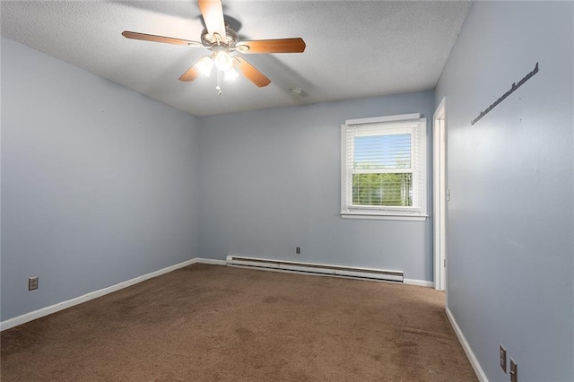 10203 Outer Rd, Odessa, MO 64076 - carpeted spare room with a baseboard heating unit, ceiling fan, and a textured ceiling