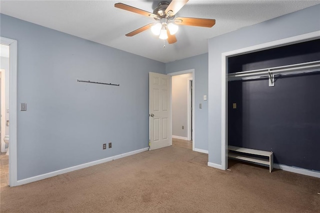 10203 Outer Rd, Odessa, MO 64076 - unfurnished bedroom featuring carpet flooring, a closet, and a ceiling fan