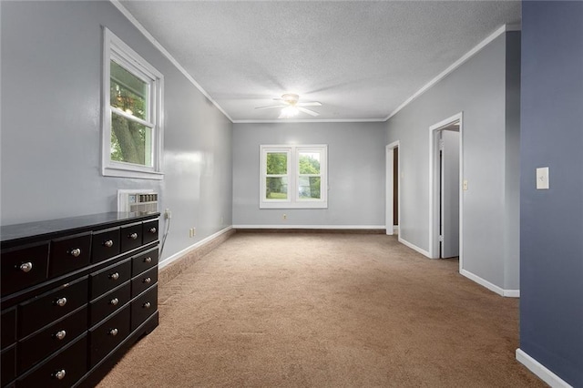 10203 Outer Rd, Odessa, MO 64076 - carpeted empty room with ornamental molding, ceiling fan, a textured ceiling, and a wall unit AC