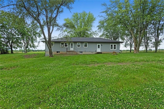10203 Outer Rd, Odessa, MO 64076 - back of house featuring a yard