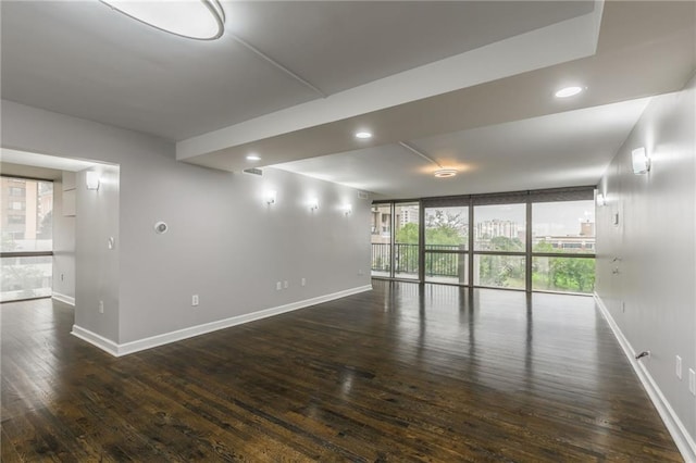 600 E Admiral Blvd Unit 601, Kansas City, MO 64106 - unfurnished room with baseboards, wood-type flooring, healthy amount of natural light, and recessed lighting